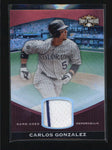 CARLOS GONZALEZ 2011 TOPPS TRIPLE THREADS GAME USED WORN JERSEY #21/36 AB5872